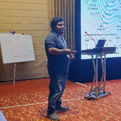 Dr. Abir Sarbajna presenting research at a conference